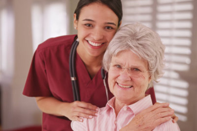 a happy nurse and a caregiver