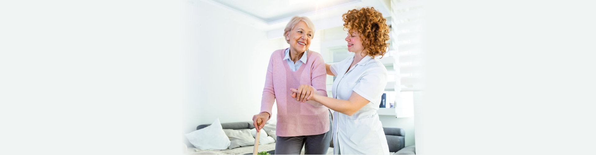 two women standing in a room