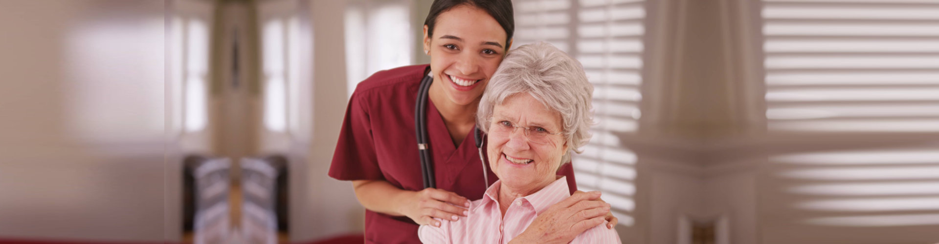 a happy nurse and a caregiver