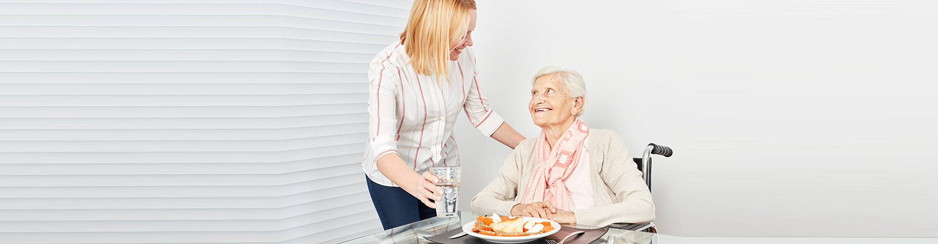 a mother eating with a girl