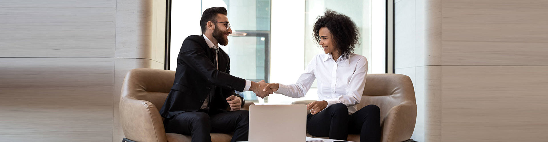 two person shaking hands